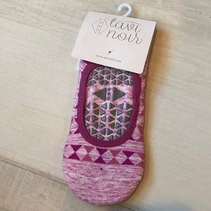 Tavi Noir sticky socks size small